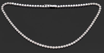 Lot 434 - A 9ct white gold diamond line necklace, set...