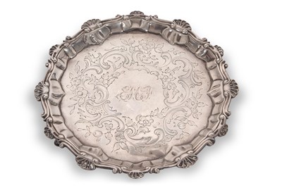 Lot 310 - A George III silver waiter having a pie crust...