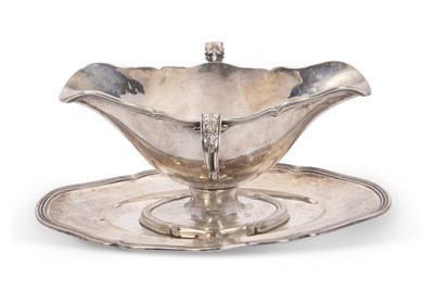 Lot 321 - A French silver sauce boat double lipped and...