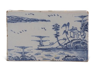 Lot 73 - An English Delft flower brick probably Lambeth...