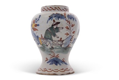 Lot 74 - An unusual English Delft vase of baluster...