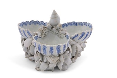 Lot 110 - An early Bow porcelain triple salt with blue...