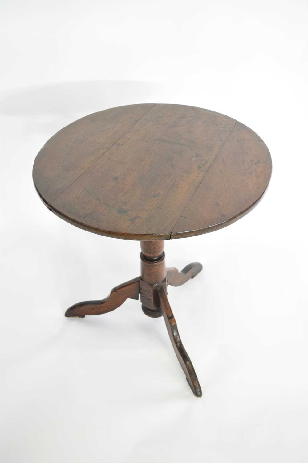 Lot 402 - Georgian oak wine table with circular top...