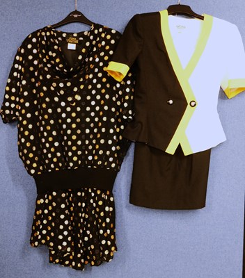 Lot 38 - Two 1980's lady's suits, to include a black,...