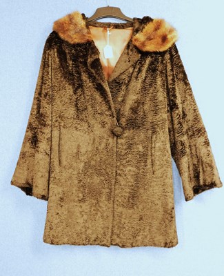 Lot 102 - A lady's single breasted brown fur coat with...