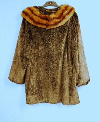 Lot 102 - A lady's single breasted brown fur coat with...