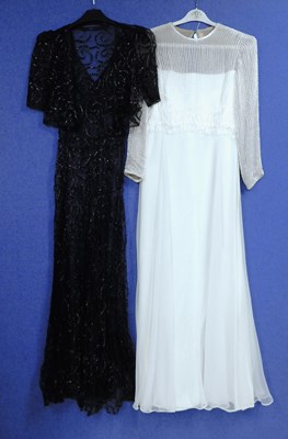 Lot 48 - A lady's black net and sequin ribbon V neck...