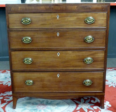 Lot 410 - Georgian mahogany chest of four drawers fitted...