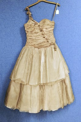 Lot 43 - A lady's one shoulder gilt taffeta dress by...