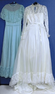 Lot 90 - A c.1970's/80's cream wedding dress with...