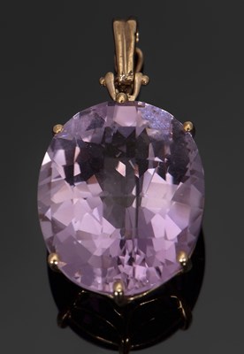 Lot 427 - A 9ct amethyst pendant, the oval mixed cut...