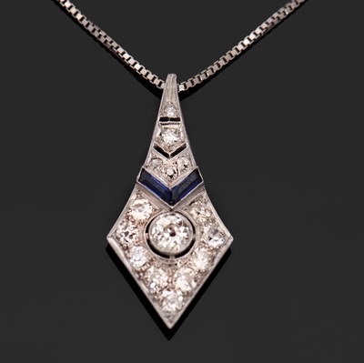 Lot 402 - An Art Deco sapphire and diamond pendant, the...