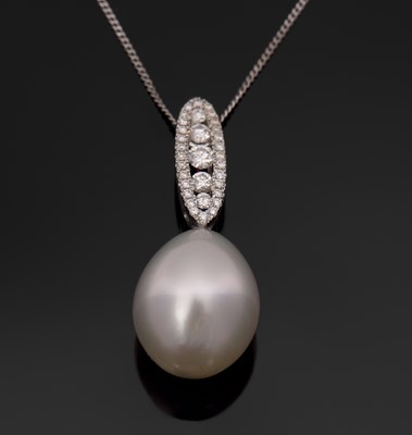 Lot 430 - An 18ct cultured pearl and diamond pendant,...