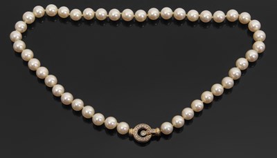 Lot 96 - A cultured pearl necklace and 18ct diamond...