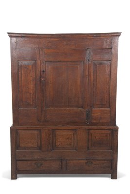 Lot 557 - An early 18th Century oak press cupboard...