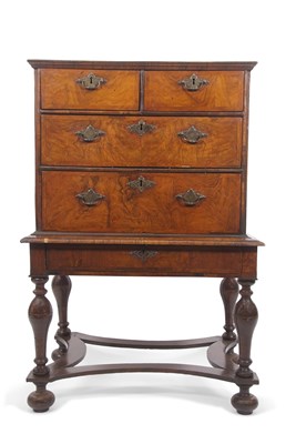 Lot 555 - An 18th Century walnut chest on stand, the...