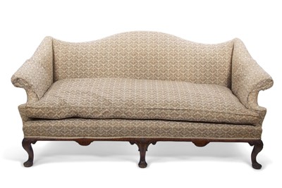 Lot 542 - A camel backed sofa upholstered in beige...