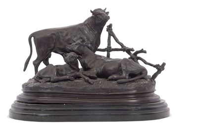 Lot 503 - A hollow bronze model of a cattle family set...