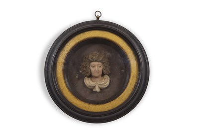 Lot 512 - A George III wax bust set in a ebonised...