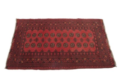 Lot 581 - A 20th Century Bokhara rug decorated with a...