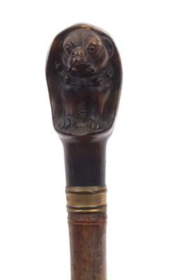 Lot 532 - An unusual Victorian walking cane, the finial...