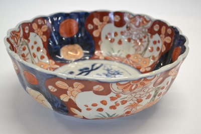 Lot 358 - A Japanese porcelain punch bowl of fluted...