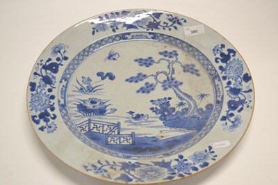 Lot 380 - A large Chinese porcelain plate with blue and...