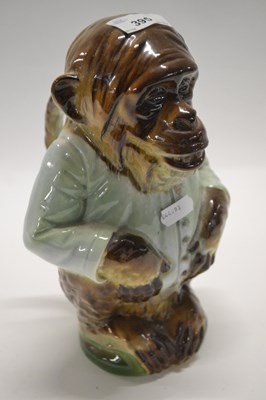 Lot 395 - A 19th Century jug modelled as a monkey with...