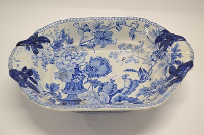 Lot 397 - A large 19th Century dish with blue and white...