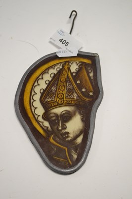 Lot 405 - A small stained glass panel modelled in...