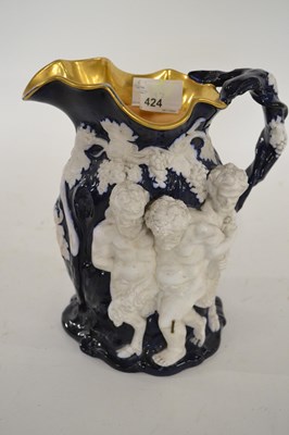 Lot 424 - A 19th Century Bacchus type jug, the blue...