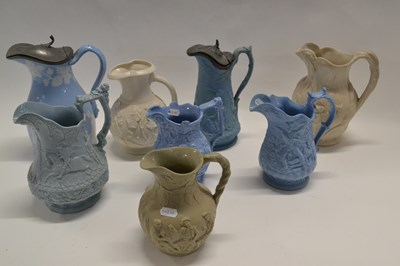 Lot 432 - A collection of mid 19th Century pottery jugs...