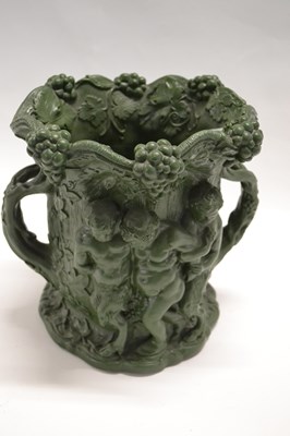 Lot 443 - A large 19th Century green glazed Bachus jug...