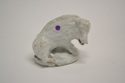 Lot 450 - A white glazed model of a boar on oval base,...