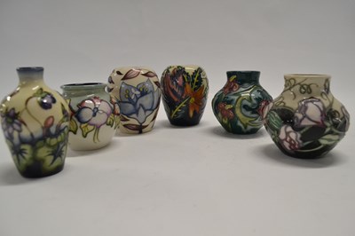 Lot 482 - A group of modern Moorcroft vases of small...