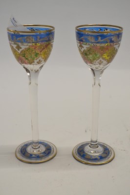 Lot 496 - A pair of cordial glasses finely enamelled in...