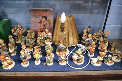 Lot 517 - An extensive quantity of Hummel figures made...