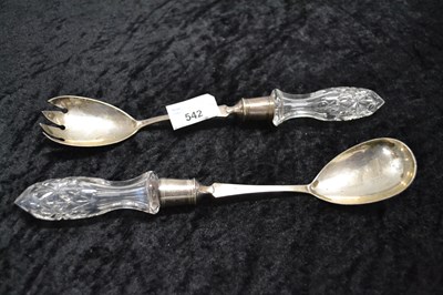 Lot 542 - A pair of silver salad servers with glass handles