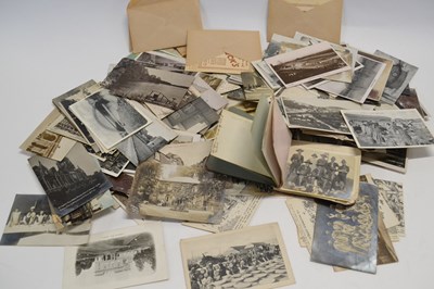 Lot 557 - A box containing a quantity of early postcards,...