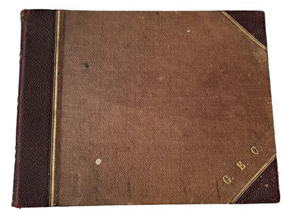 Lot 1117 - A vintage photograph album, largely depicting...