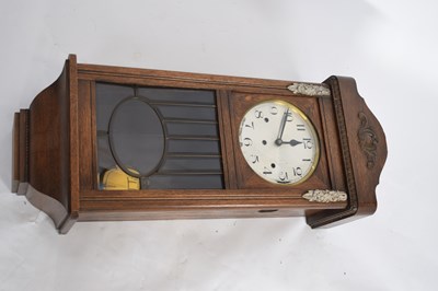 Lot 381 - Early 20th century oak cased wall clock, 80cm...