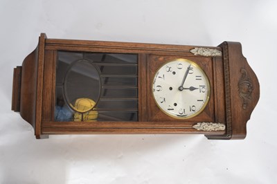 Lot 381 - Early 20th century oak cased wall clock, 80cm...