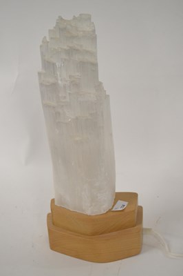 Lot 368 - A selenite lamp, with shaped, fitted wooden...