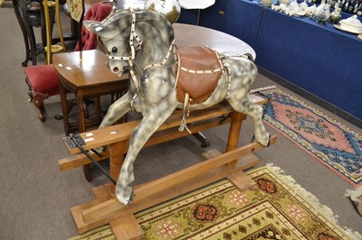 Lot 575 - A 20th Century dappled grey painted rocking...