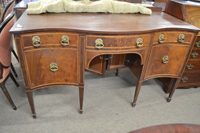 Lot 591 - A large Georgian mahogany serpentine front...