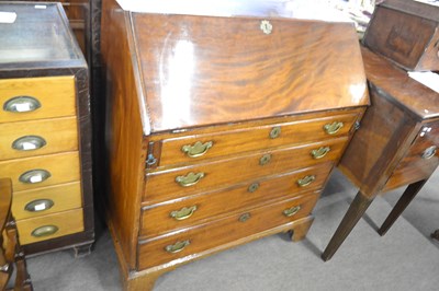 Lot 601 - A George III mahogany bureau of typical form...