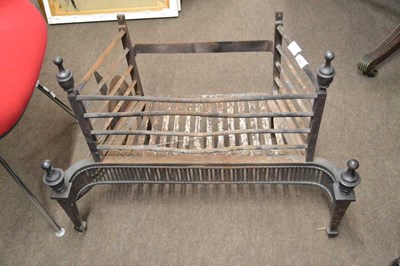 Lot 608 - A cast iron fire grate in the Georgian...