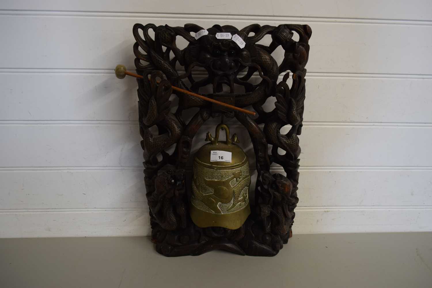 Lot 16 - TEMPLE BELL IN CARVED WOODEN FRAME