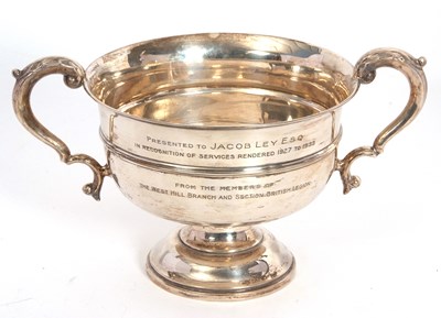 Lot 20 - A George V silver twin handled pedestal trophy...