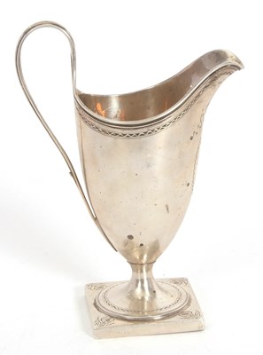 Lot 41 - A George III silver pedestal cream jug of...